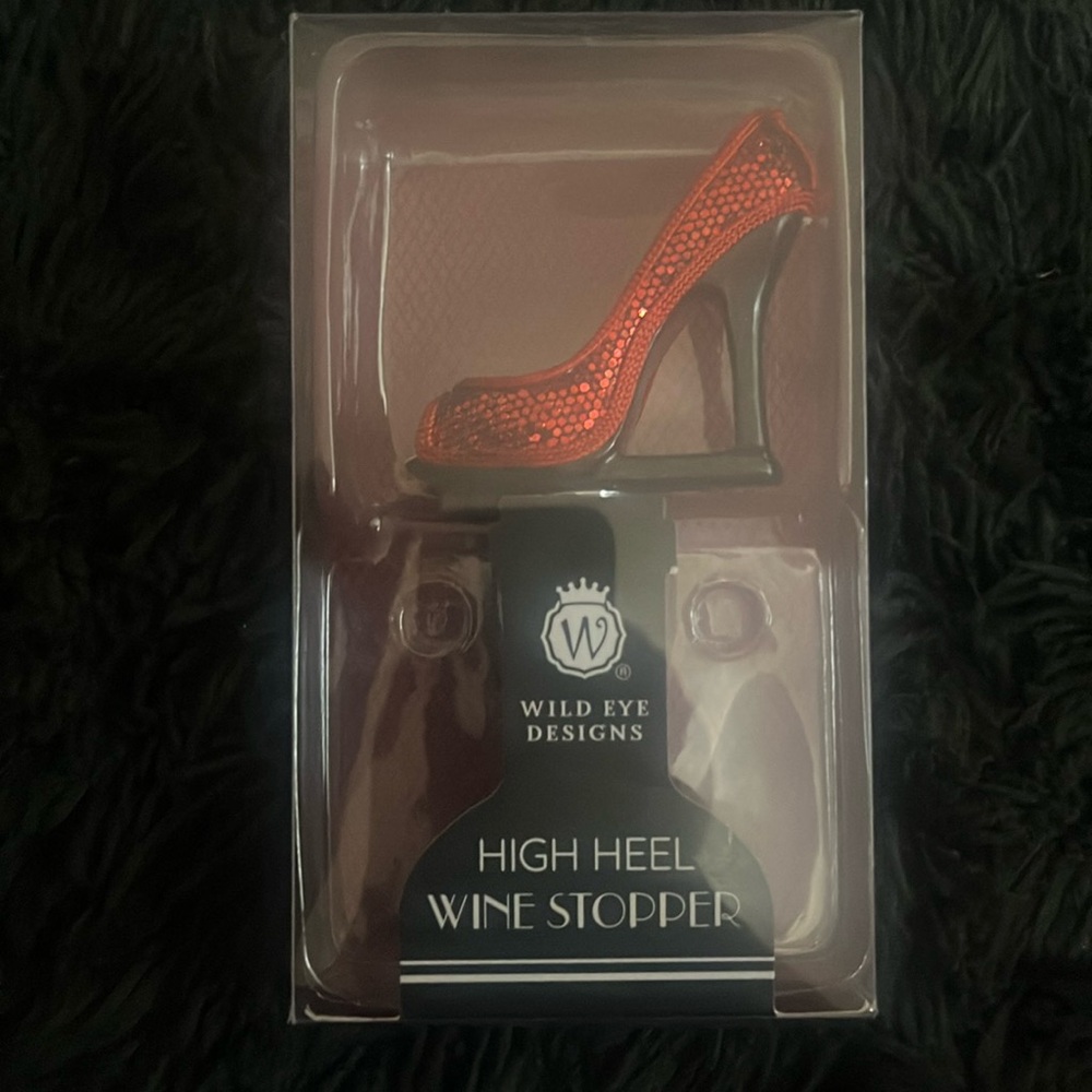 Cute red heeled wine stopper.